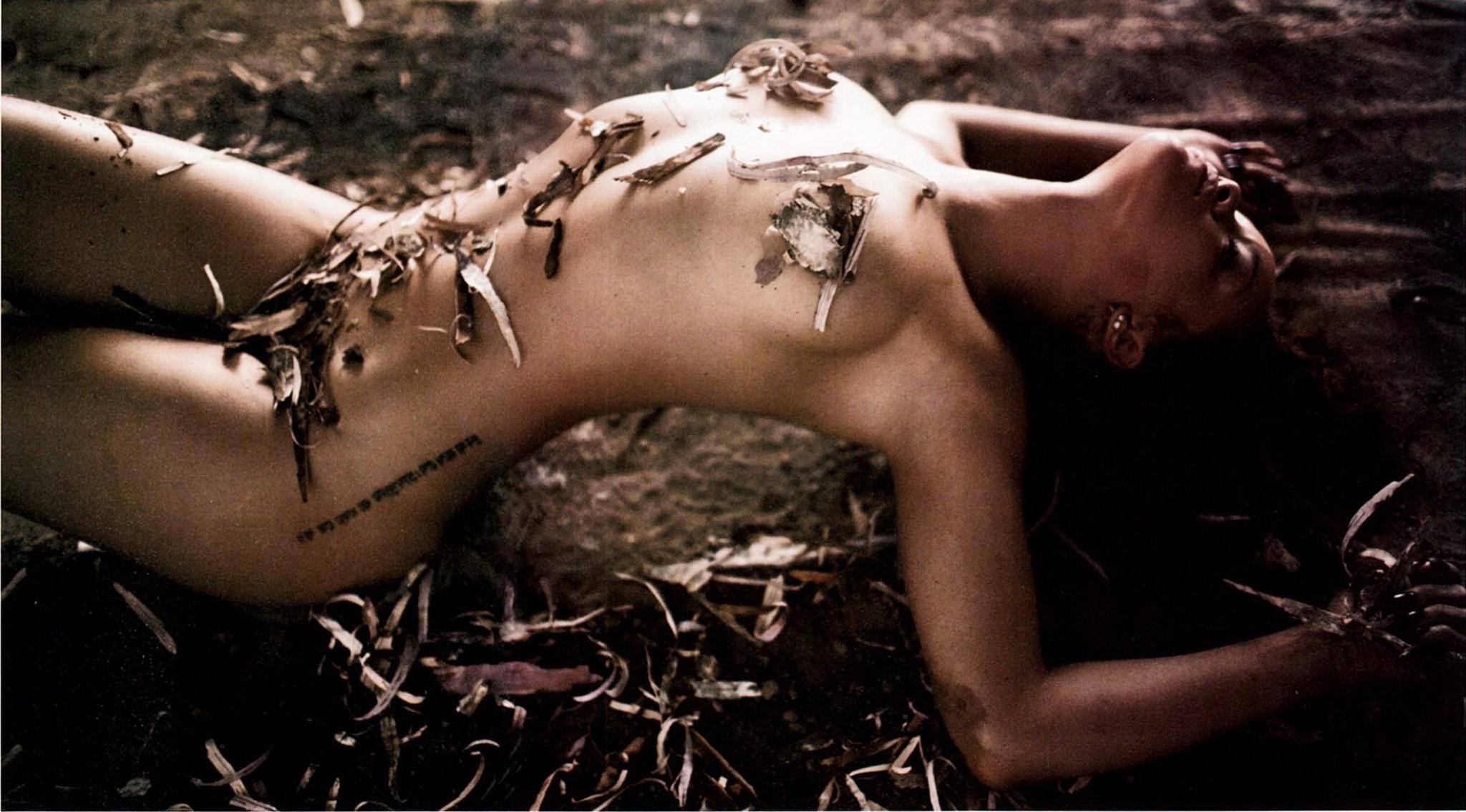 16P Rihanna fully nude but hiding for the November 2011 issue of Esquire magazine
