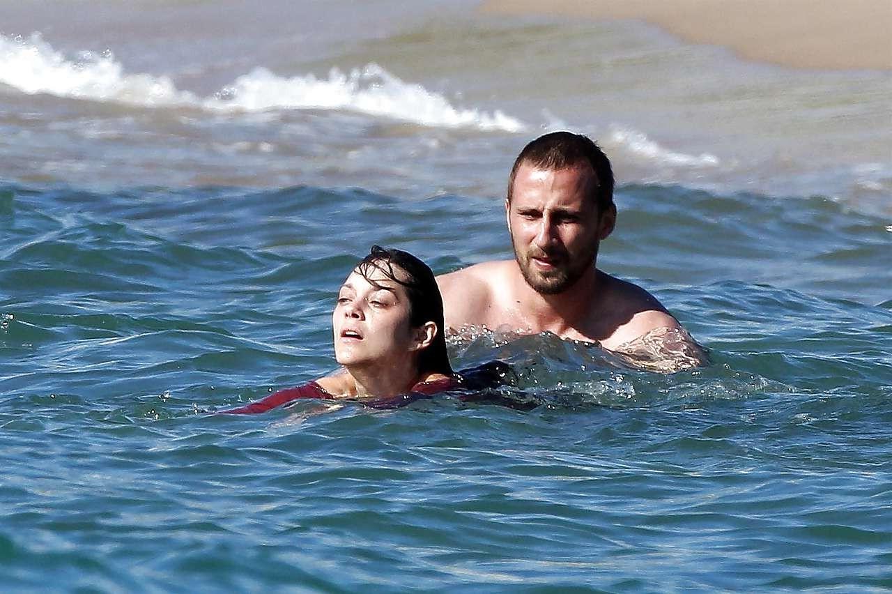 16P Marion Cotillard showing her nice big tits on beach with friend paparazzi pictur