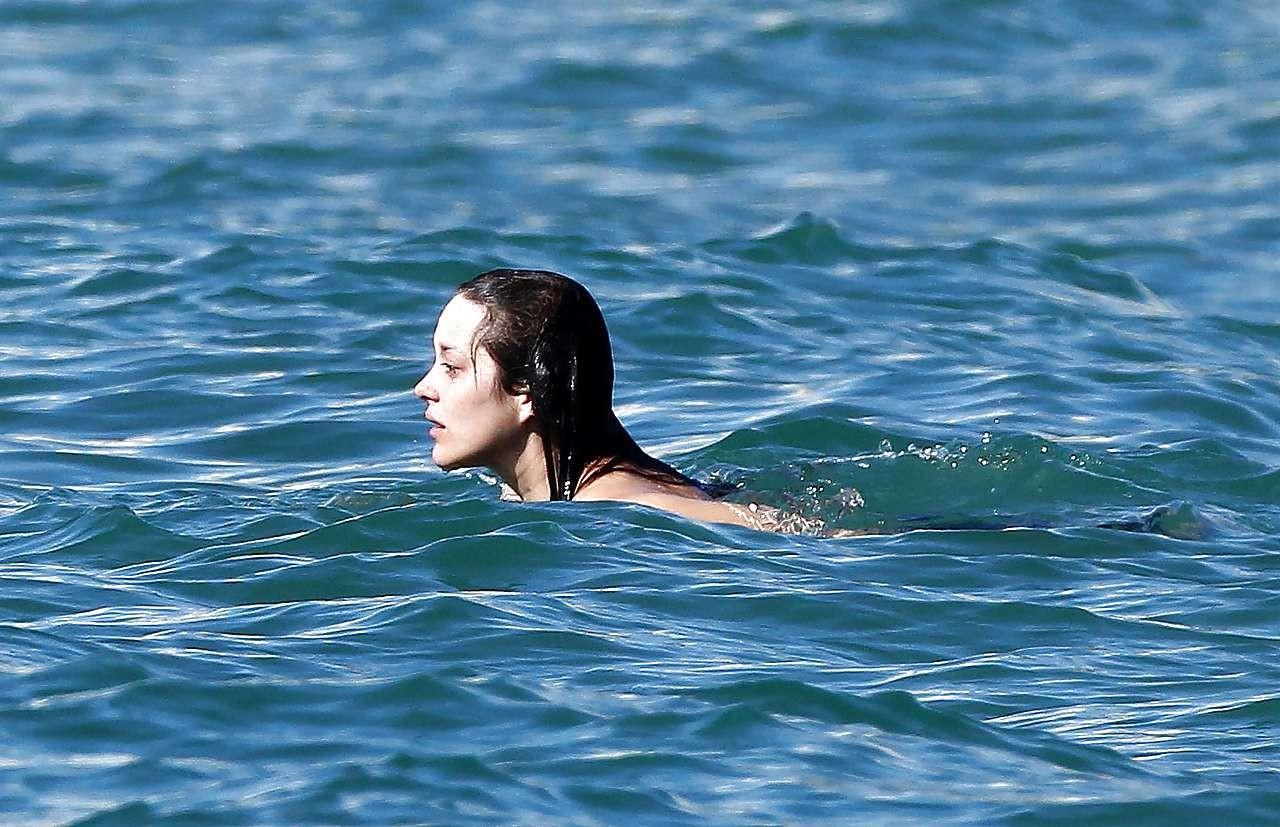 16P Marion Cotillard showing her nice big tits on beach with friend paparazzi pictur
