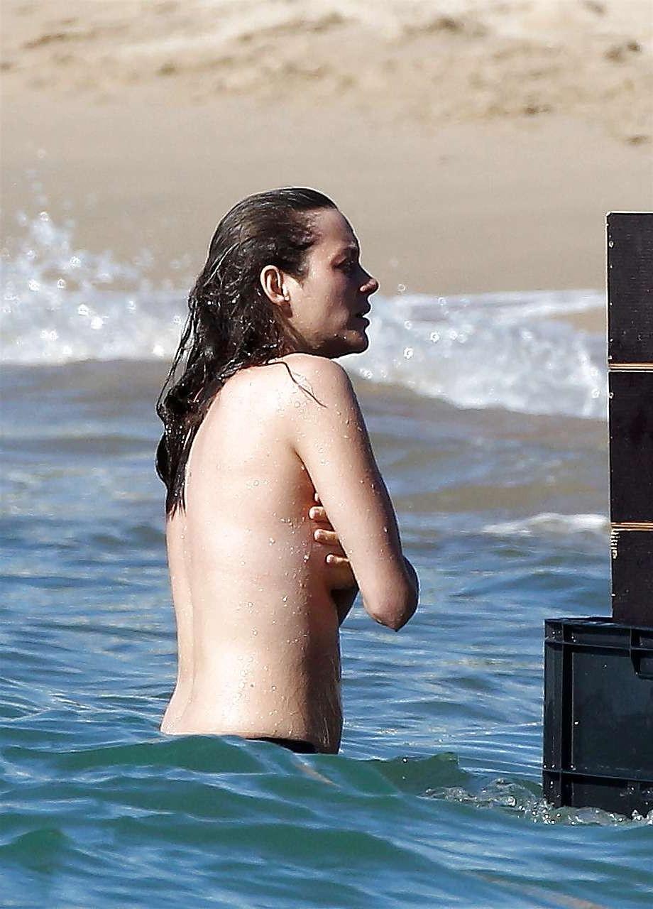 16P Marion Cotillard showing her nice big tits on beach with friend paparazzi pictur