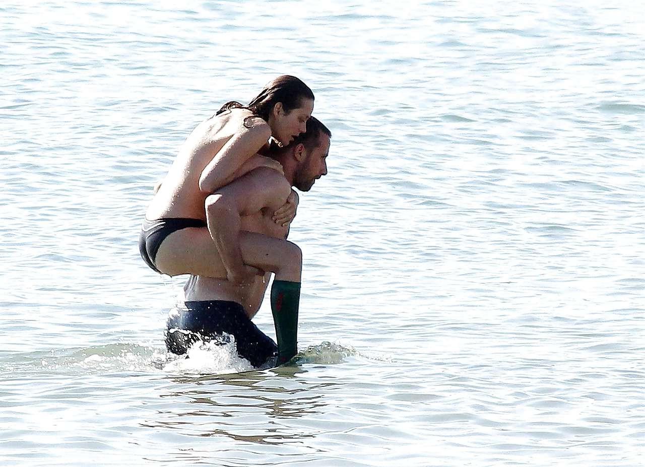 16P Marion Cotillard showing her nice big tits on beach with friend paparazzi pictur