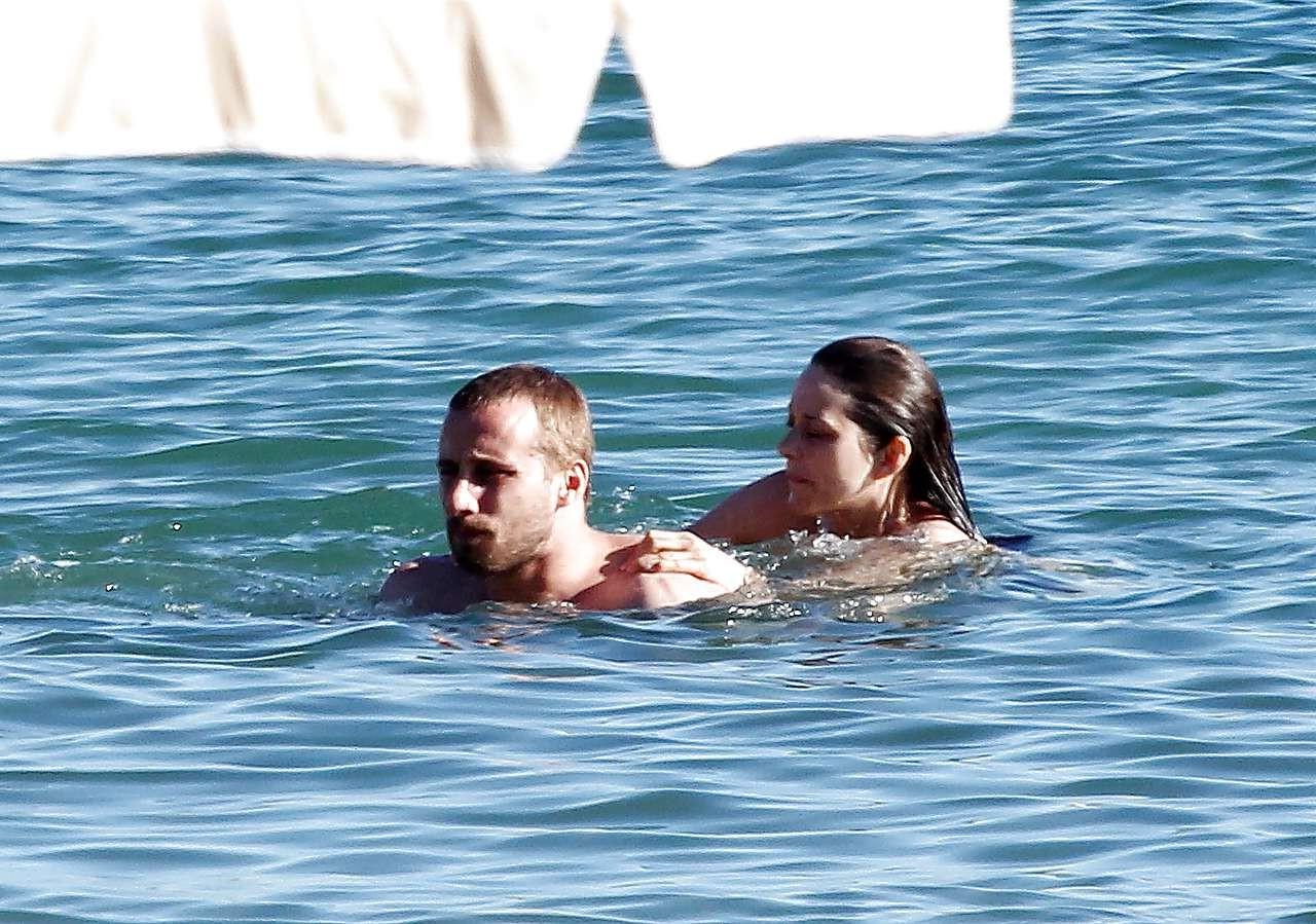 16P Marion Cotillard showing her nice big tits on beach with friend paparazzi pictur