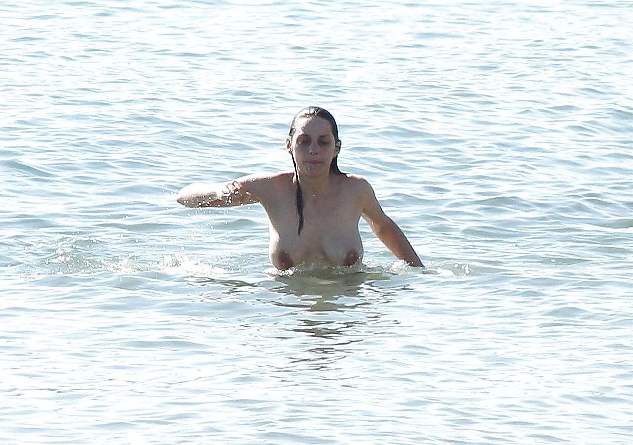 16P Marion Cotillard showing her nice big tits on beach with friend paparazzi pictur
