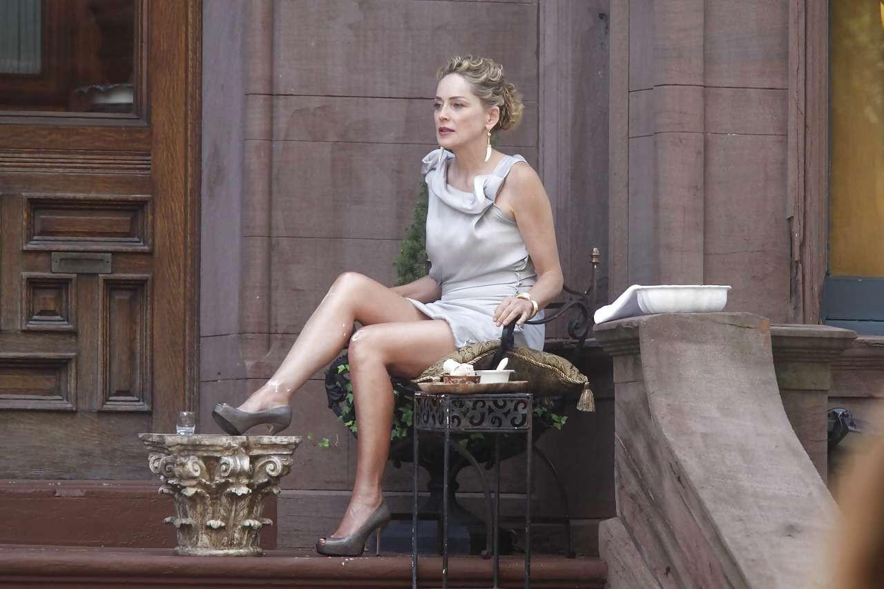 16P Sharon Stone showing her panties upskirt while spread cream on her legs