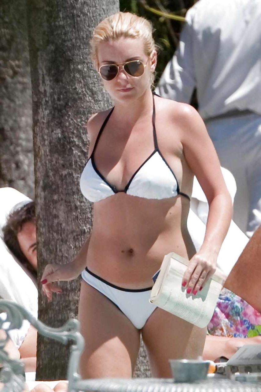 16P Sheridan Smith topless but covered with hands and in stockings paparazzi picture