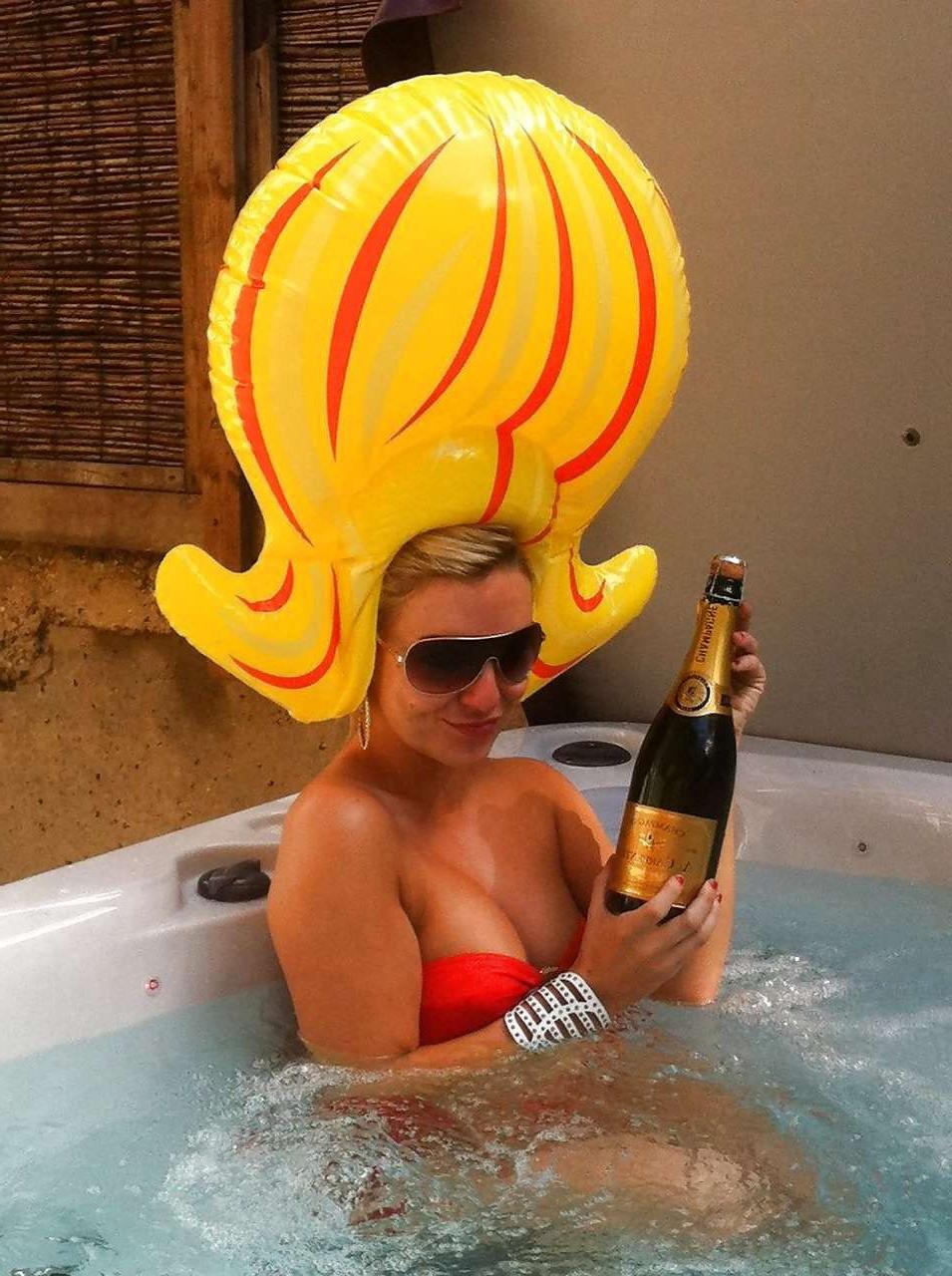 16P Sheridan Smith topless but covered with hands and in stockings paparazzi picture