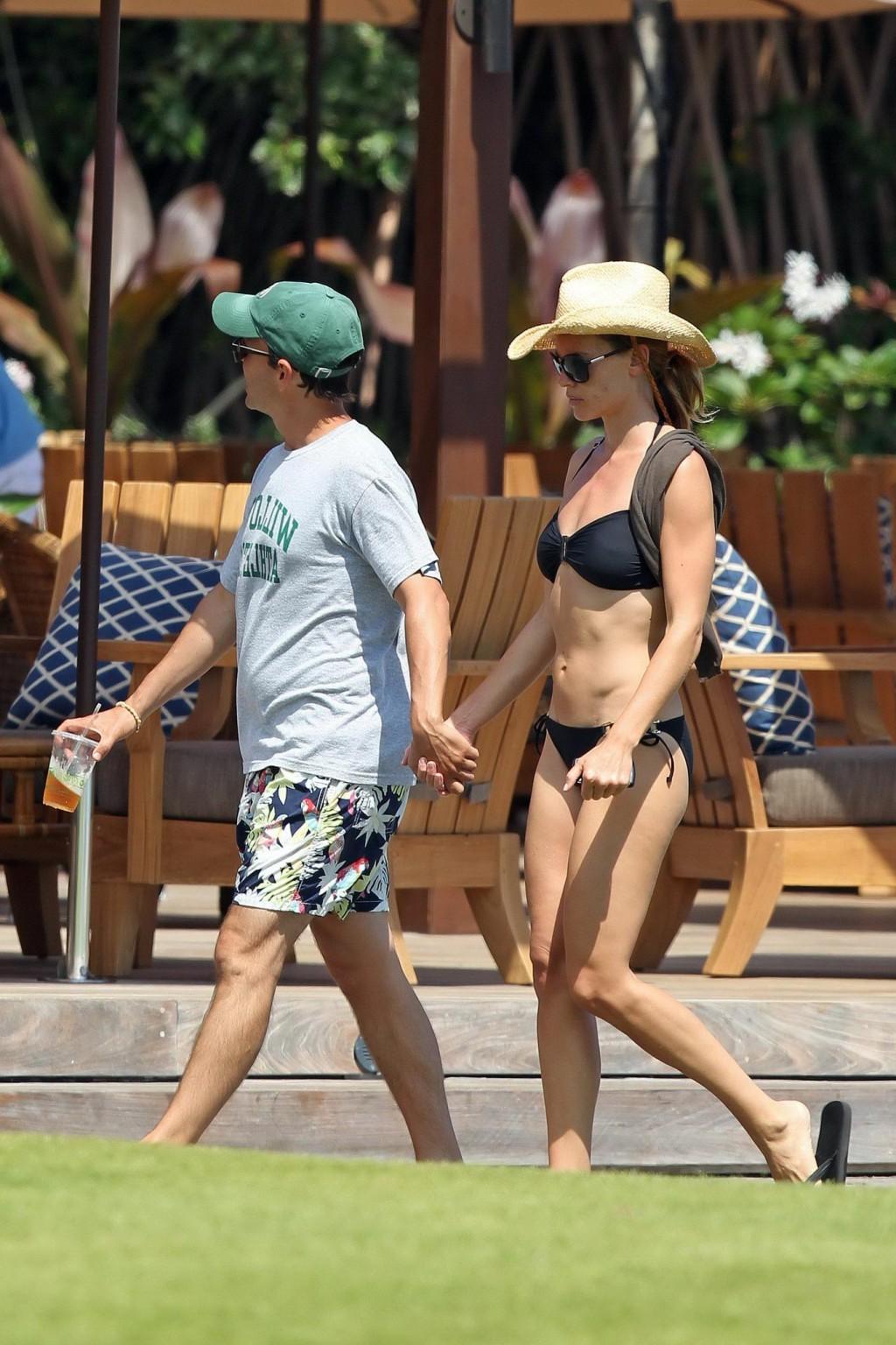 16P Hilary Swank wearing sexy black bikini poolside in Hawaii