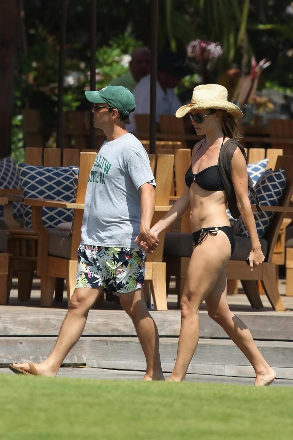 16P Hilary Swank wearing sexy black bikini poolside in Hawaii