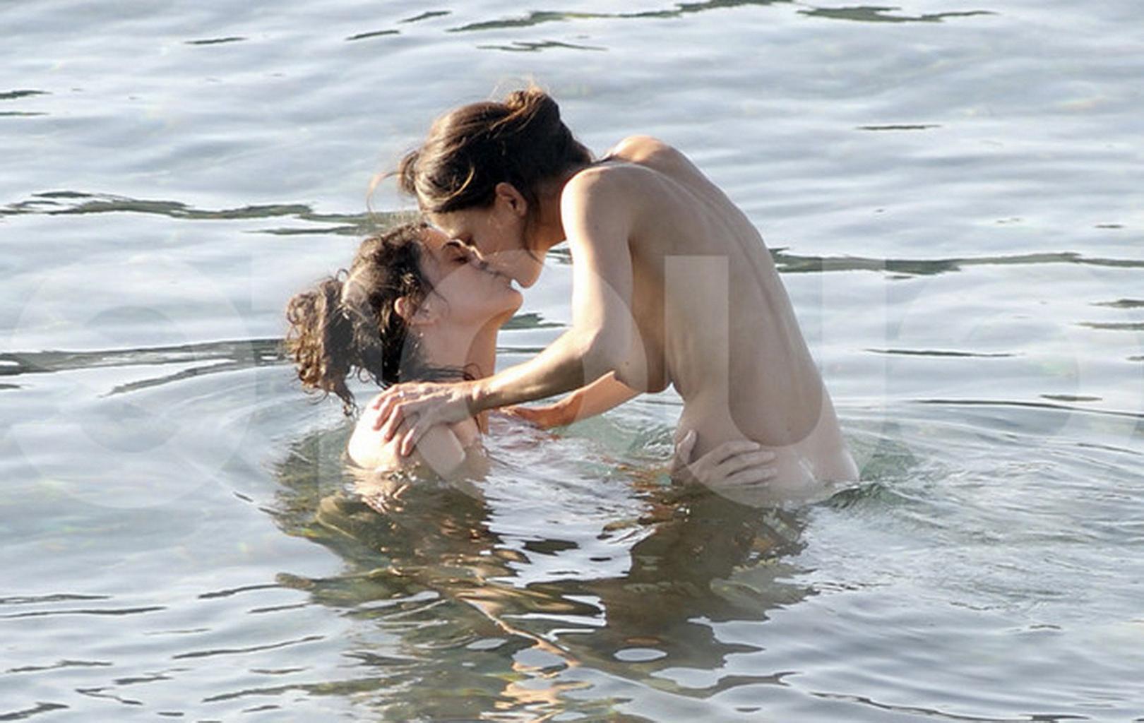 16P Elena Anaya making out with her busty girlfriend on a nudist beach