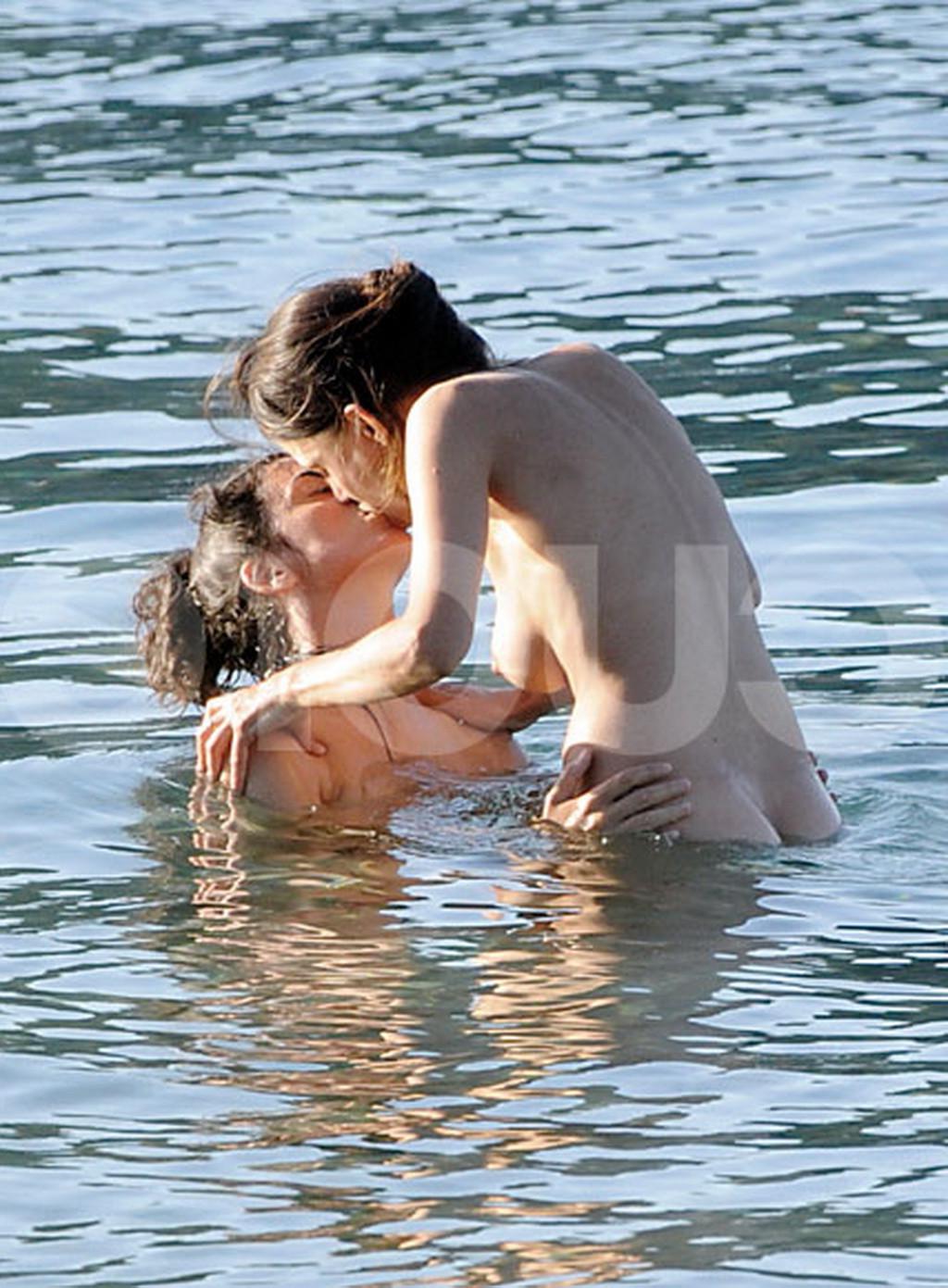 16P Elena Anaya making out with her busty girlfriend on a nudist beach