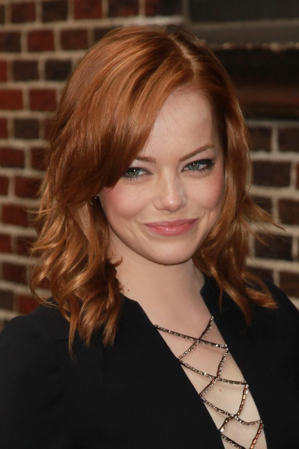 16P Emma Stone leggy wearing black mini dress outside the Ed Sullivan Theater in NYC