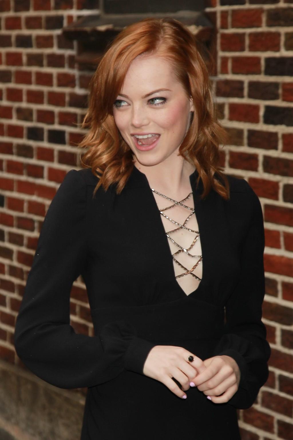 16P Emma Stone leggy wearing black mini dress outside the Ed Sullivan Theater in NYC
