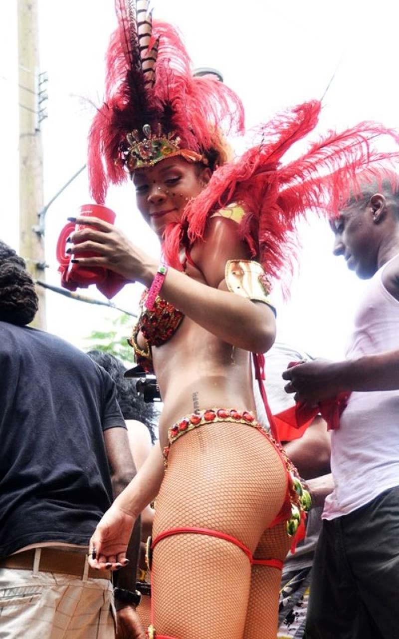 16P Rihanna exposing her sexy body and hot ass while she is dressed like a whore