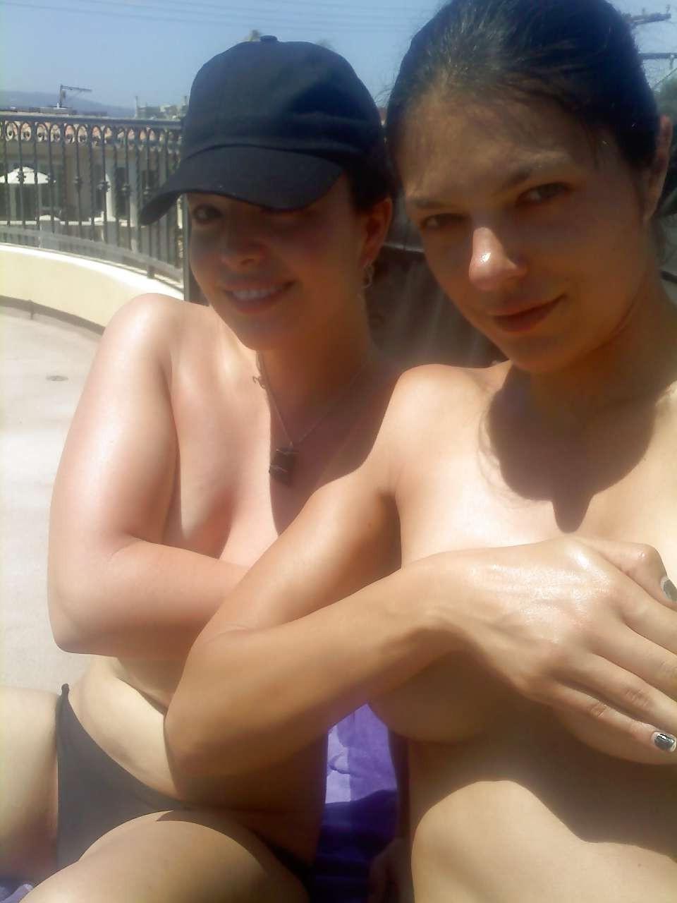 16P Adrianne Curry sunbathing topless and posing in fuckme boots