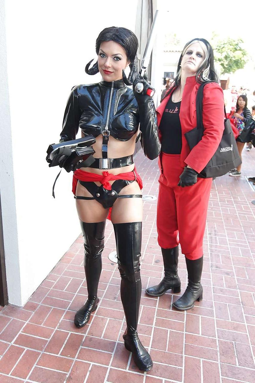 16P Adrianne Curry sunbathing topless and posing in fuckme boots