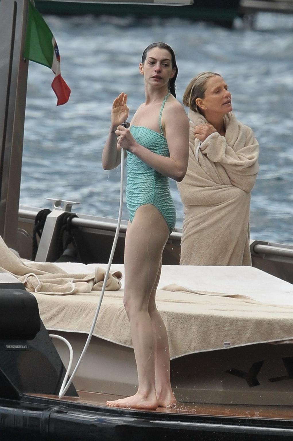 16P Anne Hathaway shows pokies wearing skimpy wet swimsuit in Italy