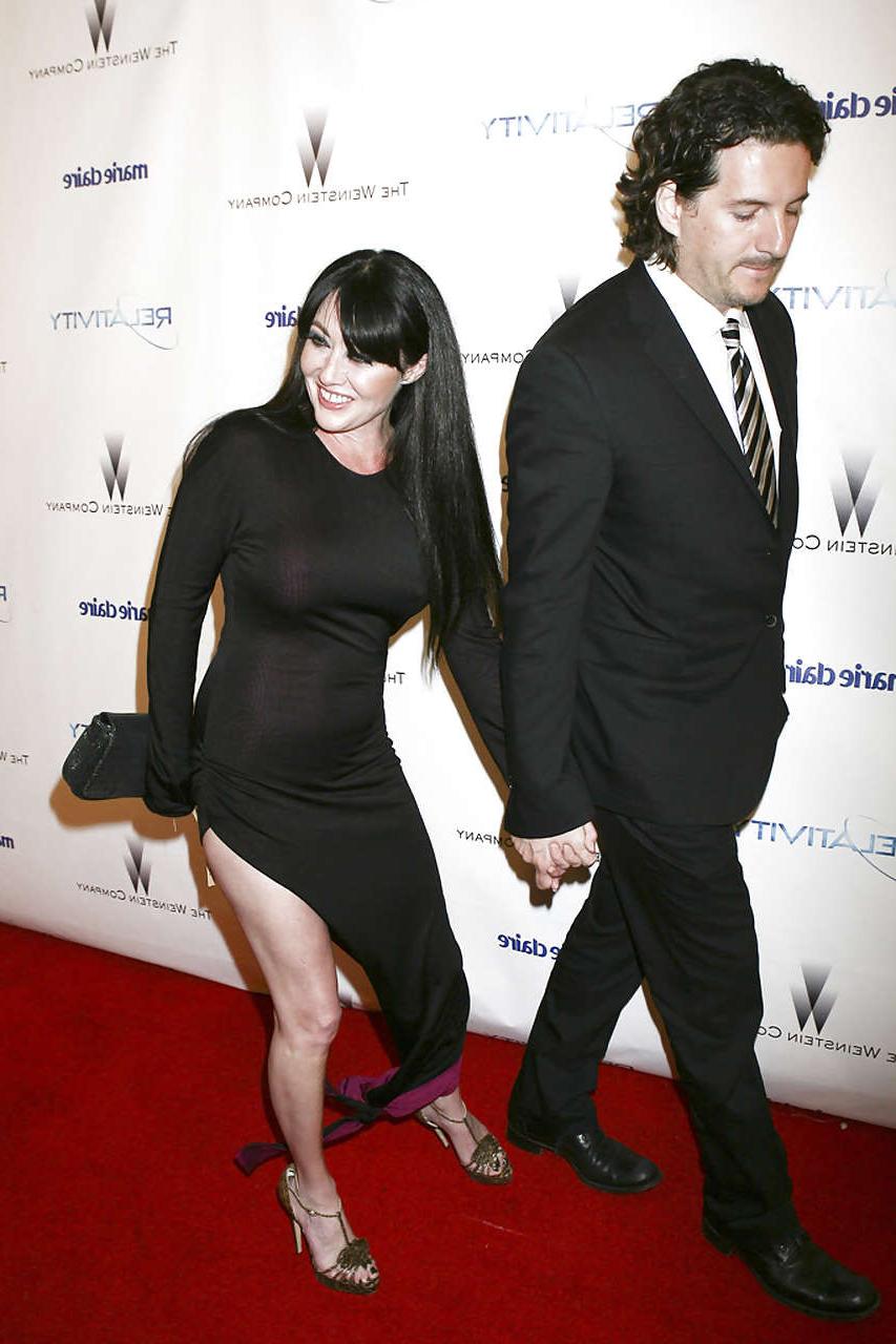 16P Shannen Doherty showing her nice big tits in see thru dress and leggy