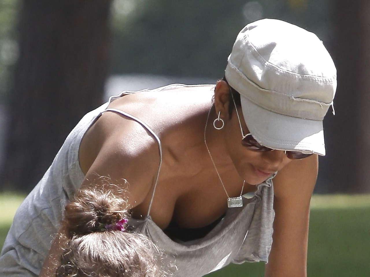 15P Halle Berry downblouse and showing her pussy and nice tits paparazzi pictures
