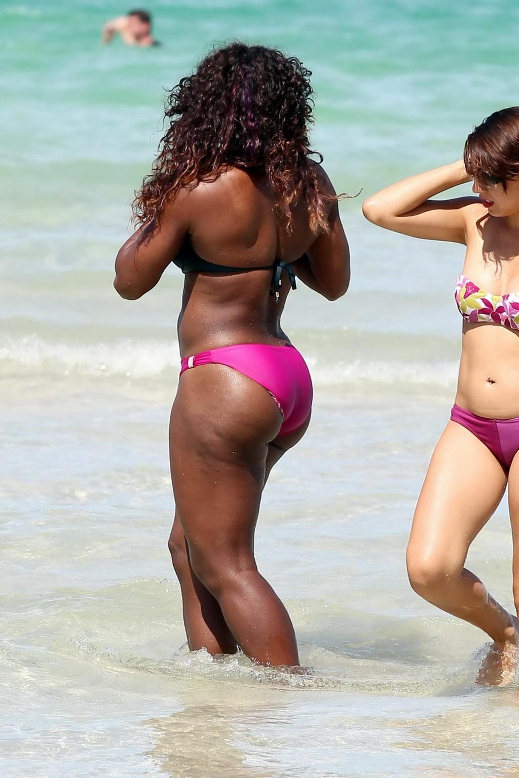 16P Serena Williams busty wearing bikini at the South Beach