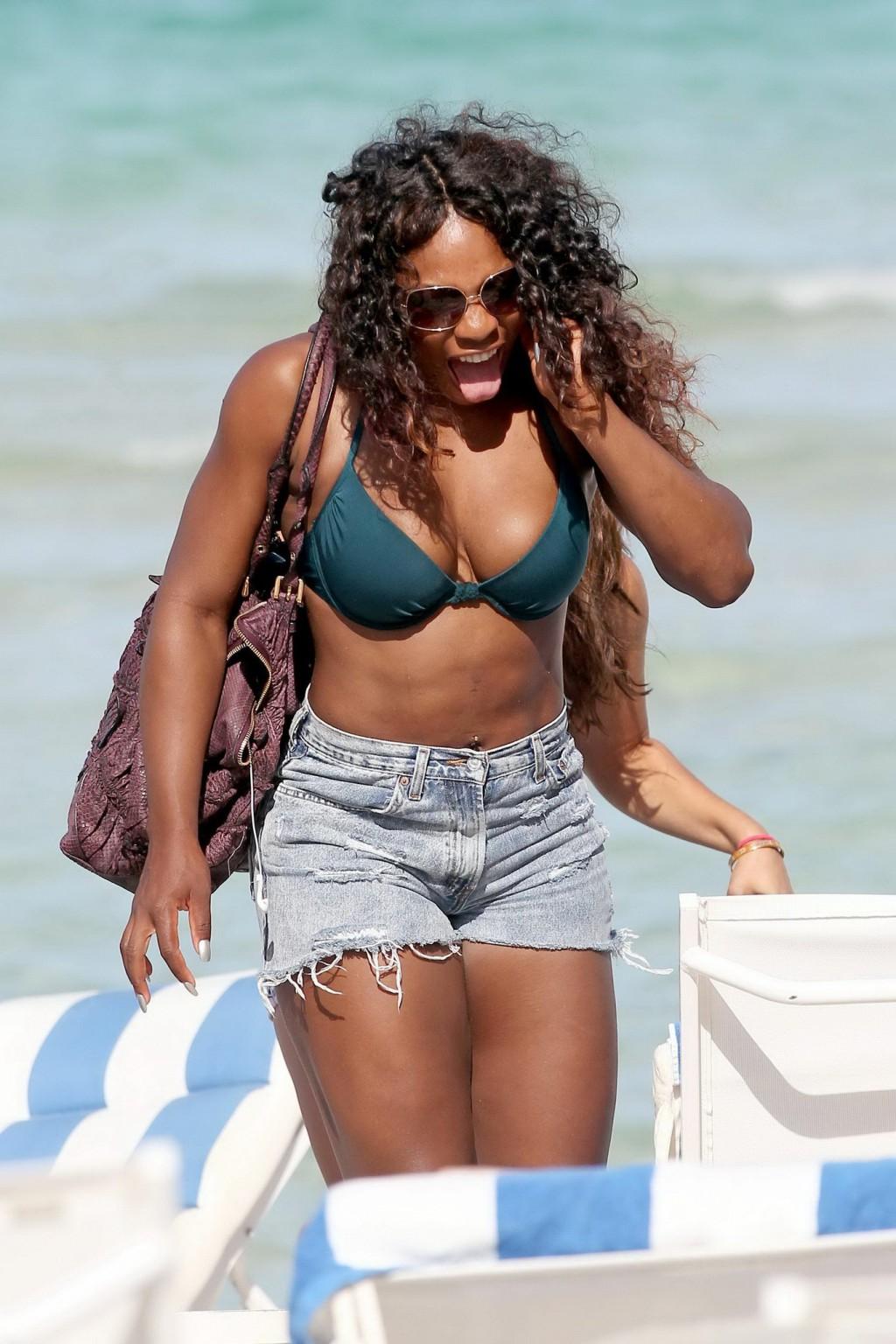 16P Serena Williams busty wearing bikini at the South Beach