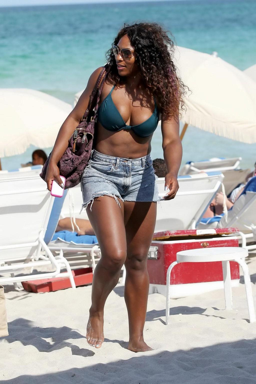 16P Serena Williams busty wearing bikini at the South Beach
