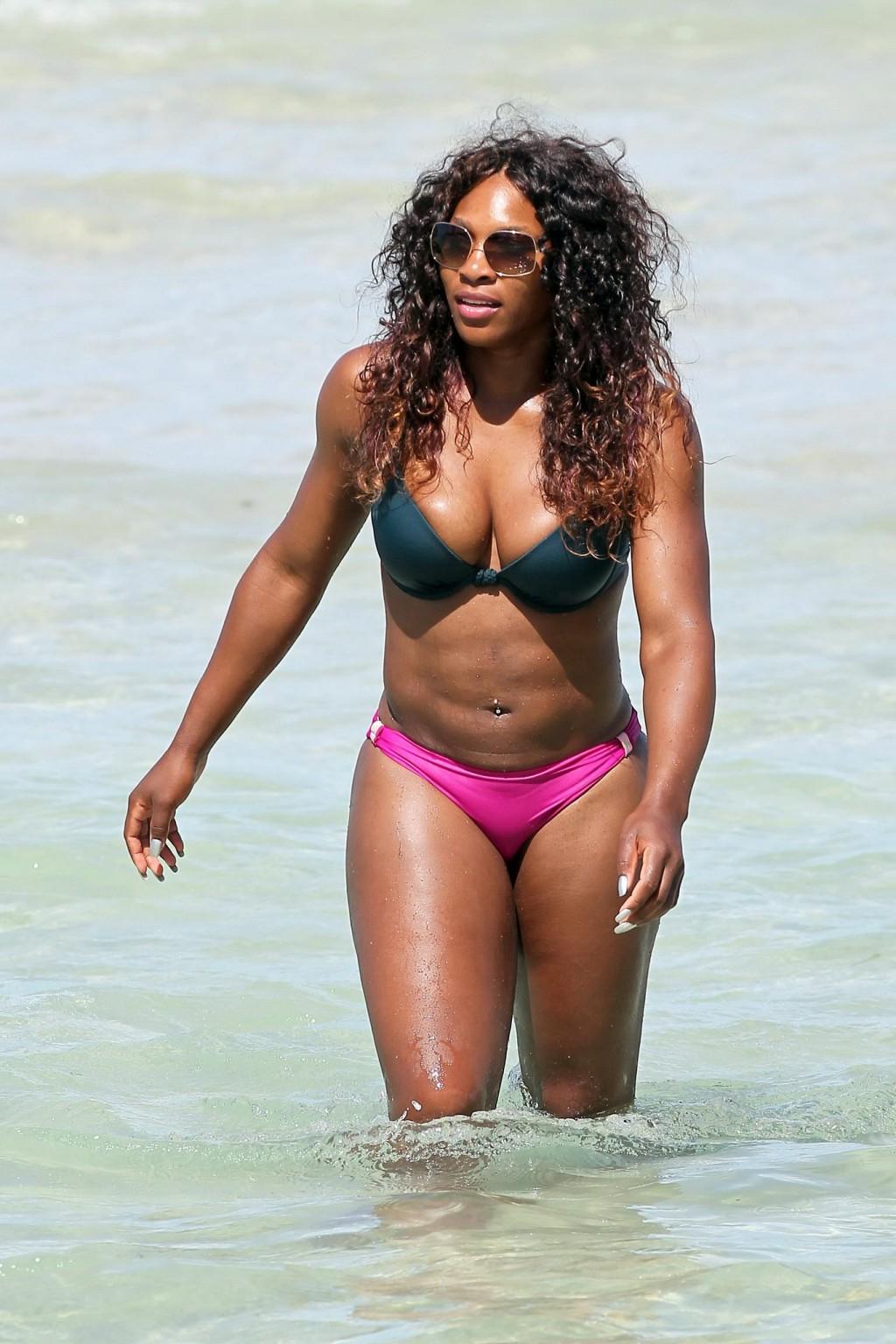 16P Serena Williams busty wearing bikini at the South Beach