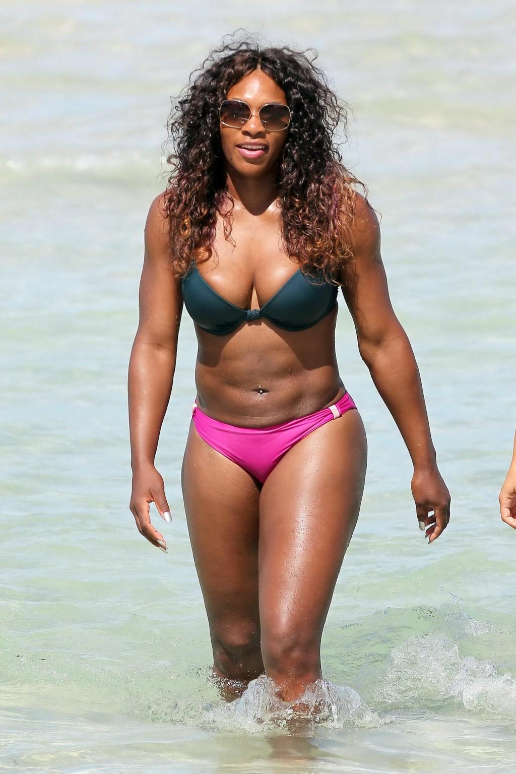 16P Serena Williams busty wearing bikini at the South Beach