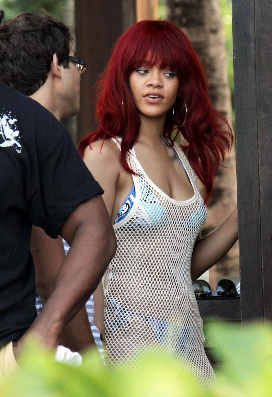 16P Rihanna exposing her fucking sexy ass and nice tits in see thru dress