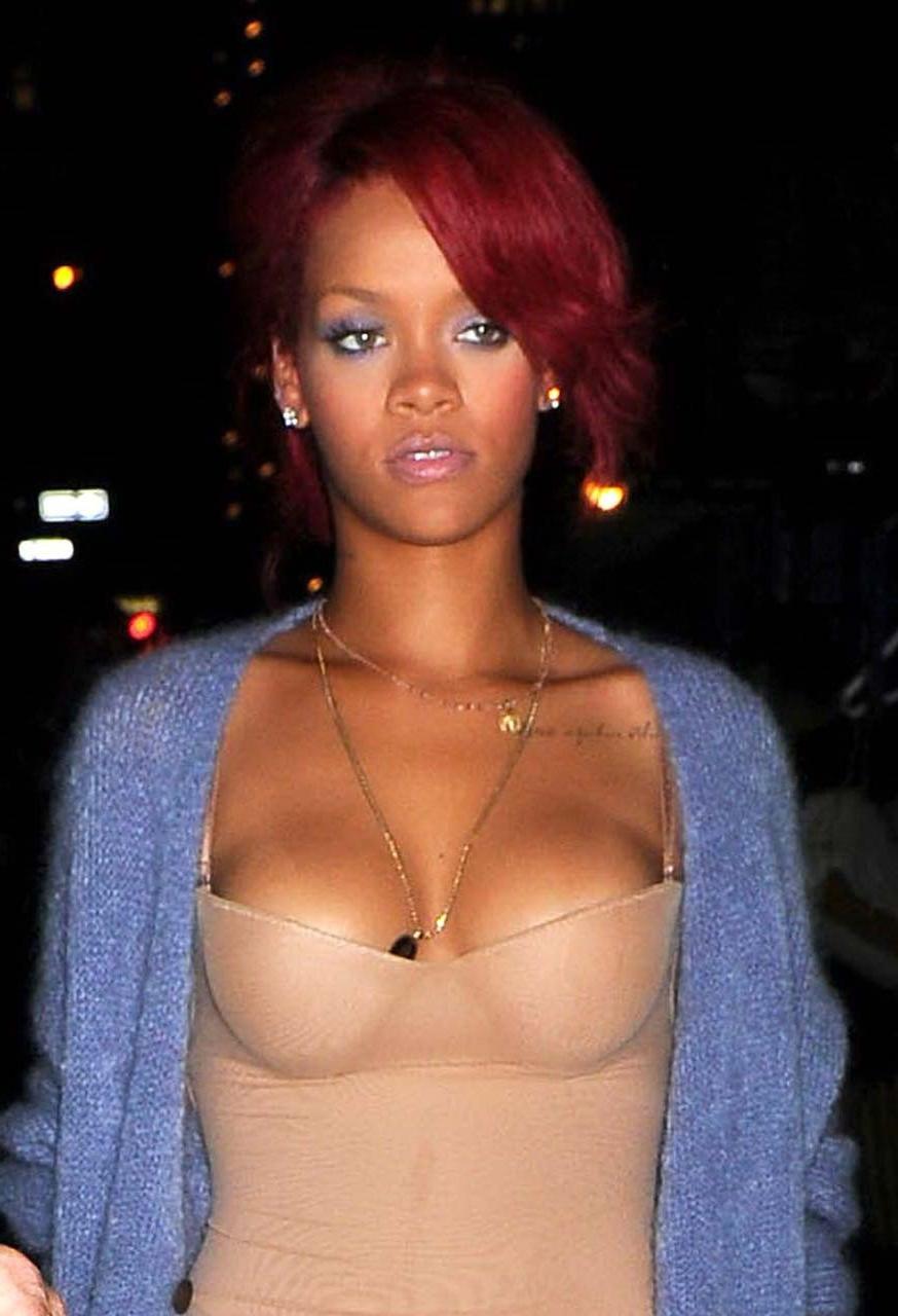 16P Rihanna exposing her fucking sexy ass and nice tits in see thru dress