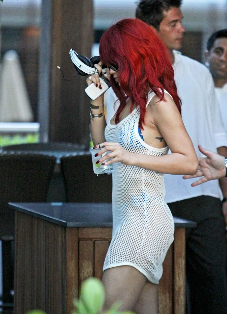 16P Rihanna exposing her fucking sexy ass and nice tits in see thru dress