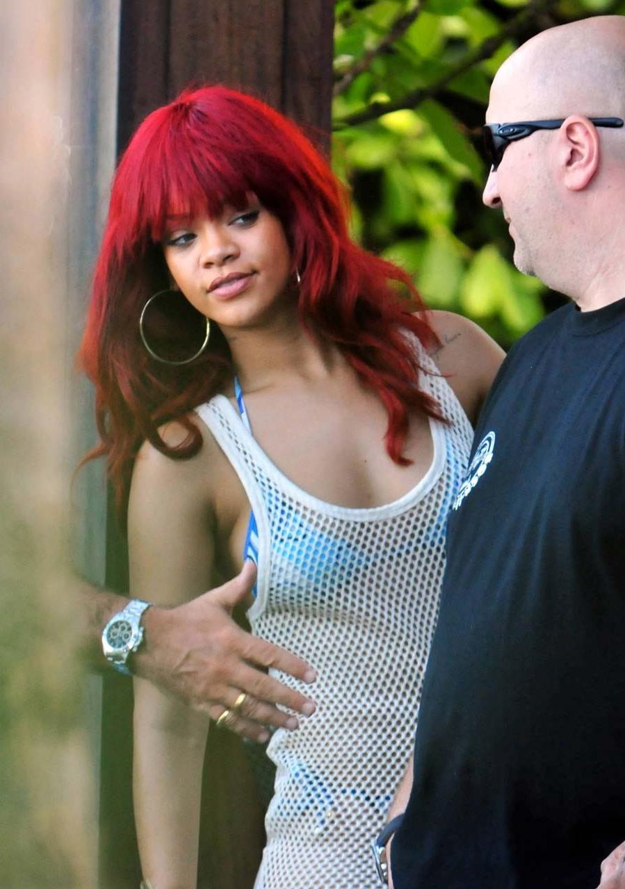 16P Rihanna exposing her fucking sexy ass and nice tits in see thru dress