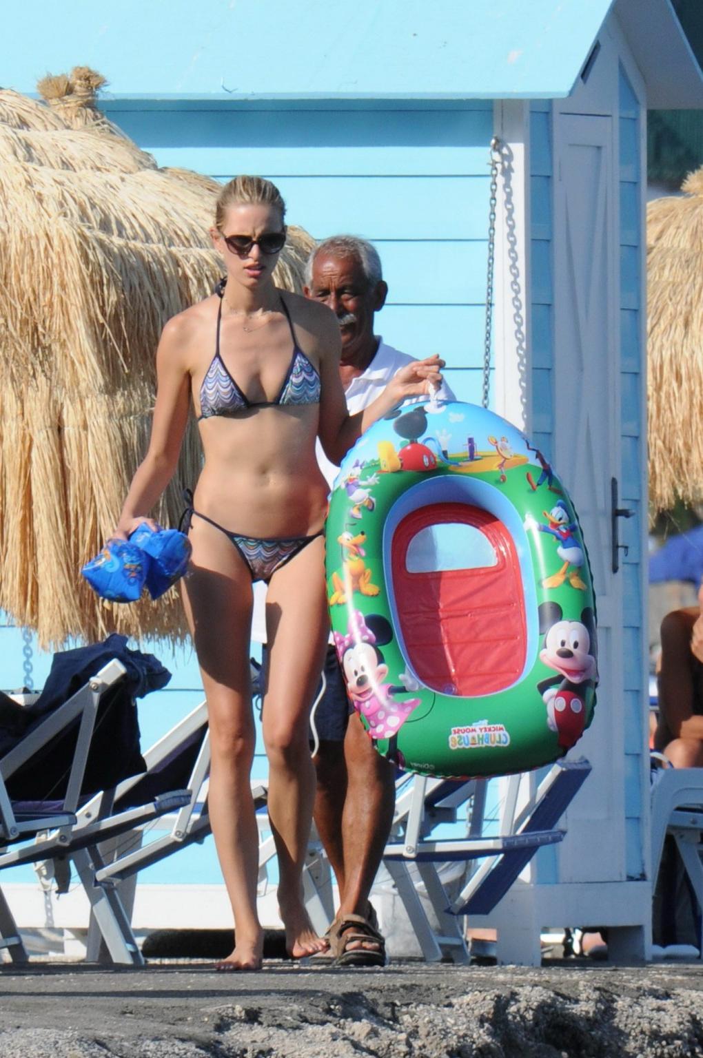 16P Karolina Kurkova wearing bikini on the Italian beach
