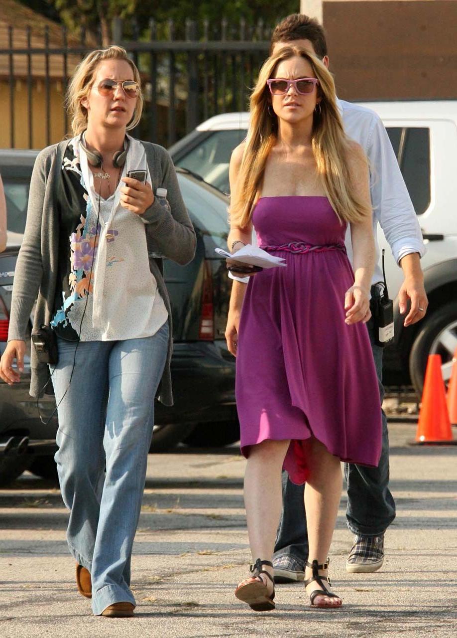 16P Lindsay Lohan posing and showing her sexy body and huge boobs