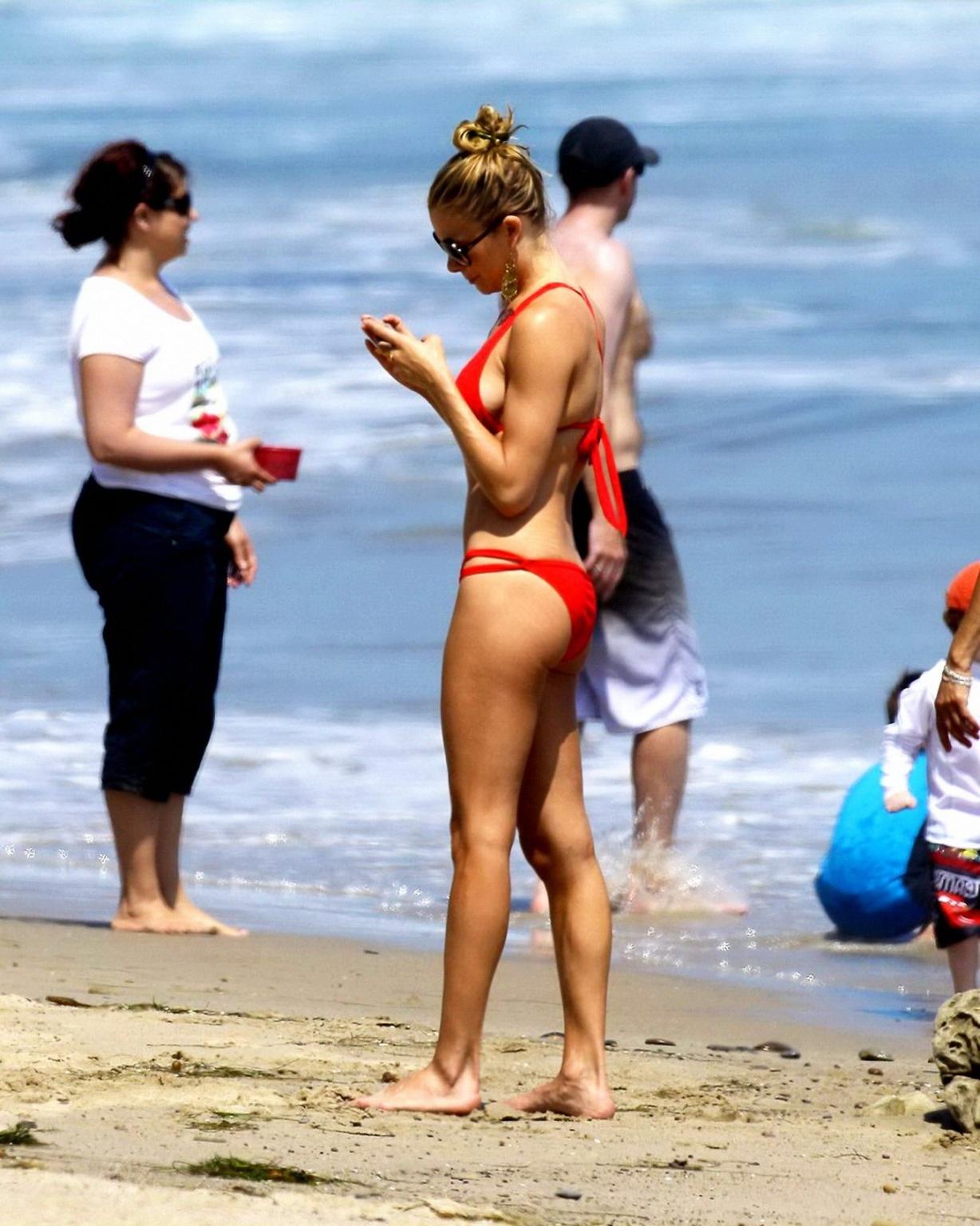 16P LeAnn Rimes wearing skimpy red bikini on Malibu Beach