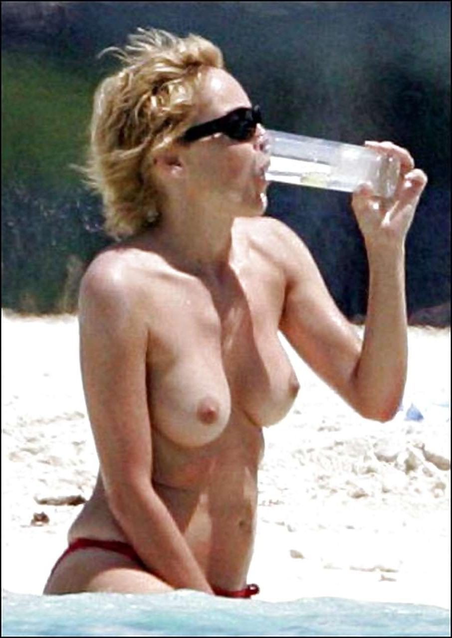 16P Sharon Stone showing her red panties upskirt photos taken by paparazzi