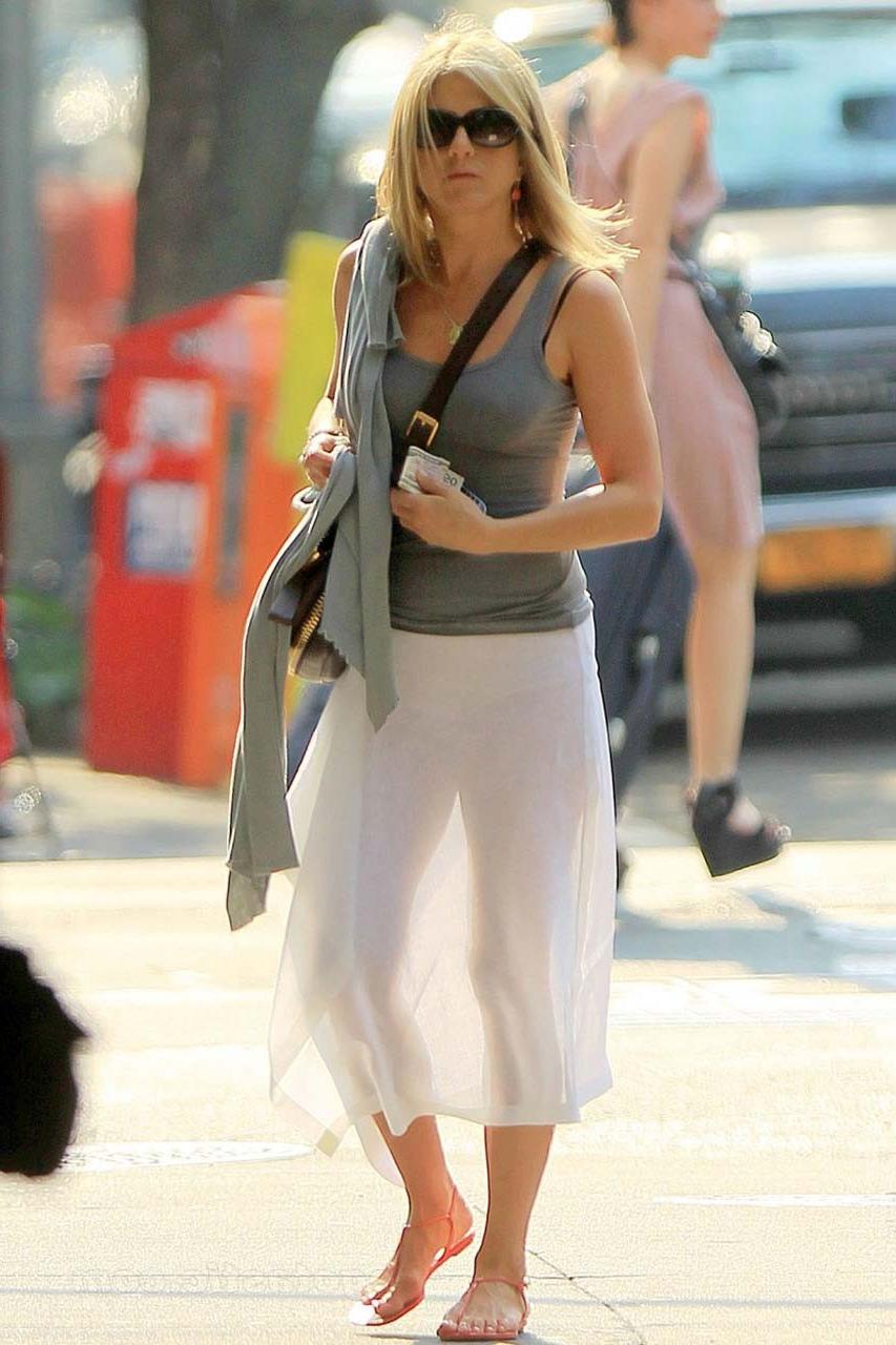 16P Jennifer Aniston exposing her sexy body and nice legs in see thru dress