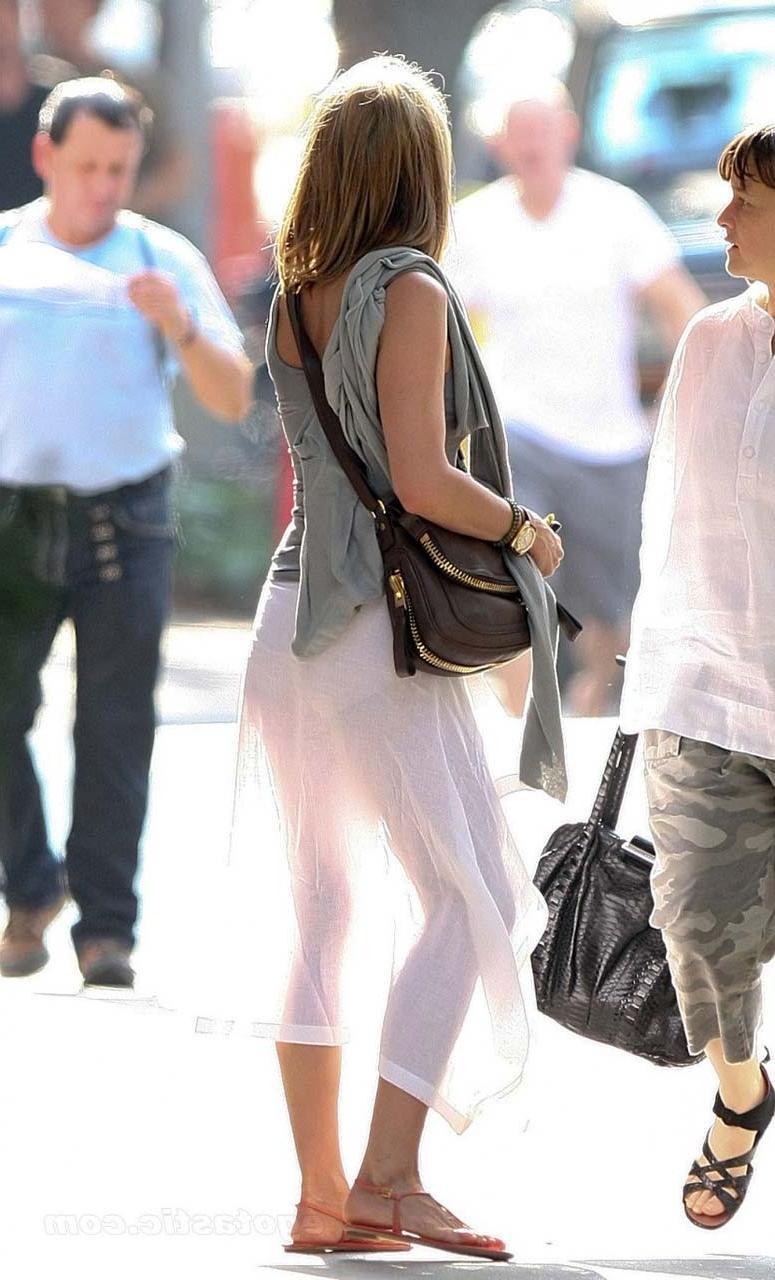 16P Jennifer Aniston exposing her sexy body and nice legs in see thru dress