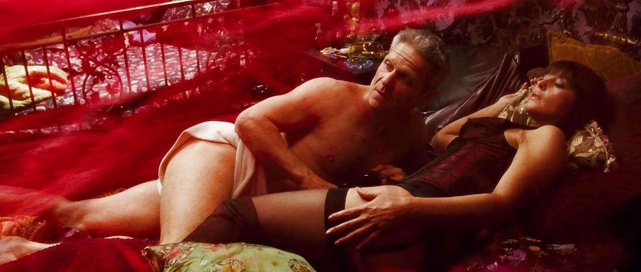 16P Monica Bellucci showing her nice big tits and fucking and posing in stockings