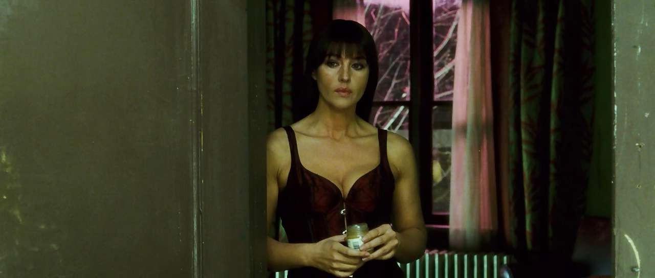 16P Monica Bellucci showing her nice big tits and fucking and posing in stockings