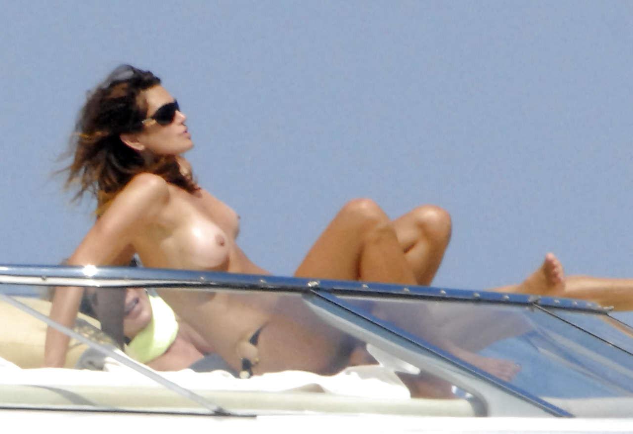 16P Cindy Crawford showing her nice big tits on yacht and upskirt paparazzi pictures