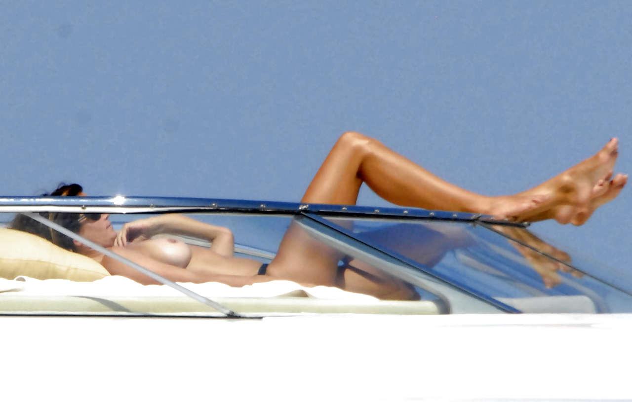 16P Cindy Crawford showing her nice big tits on yacht and upskirt paparazzi pictures