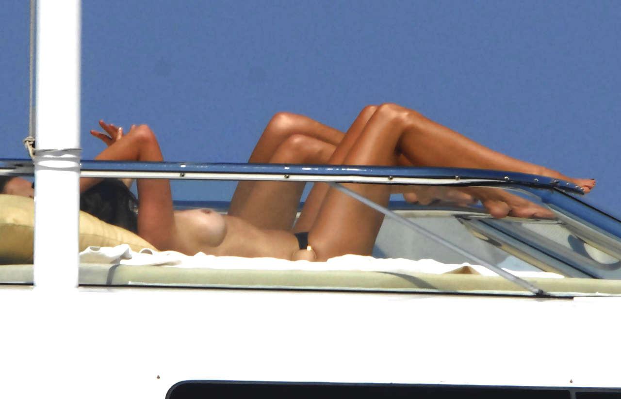 16P Cindy Crawford showing her nice big tits on yacht and upskirt paparazzi pictures