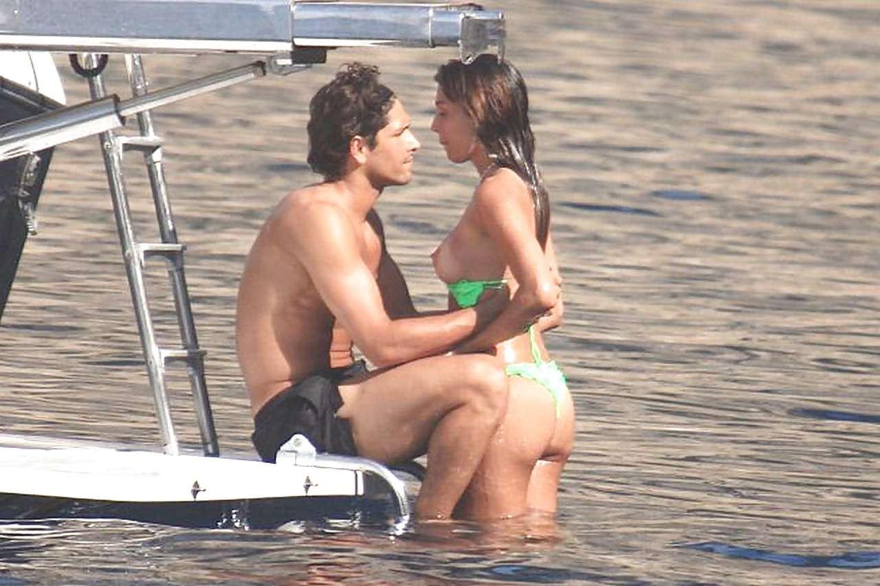 16P Belen Rodriguez exposing her nice big tits while making out with boyfriend on be