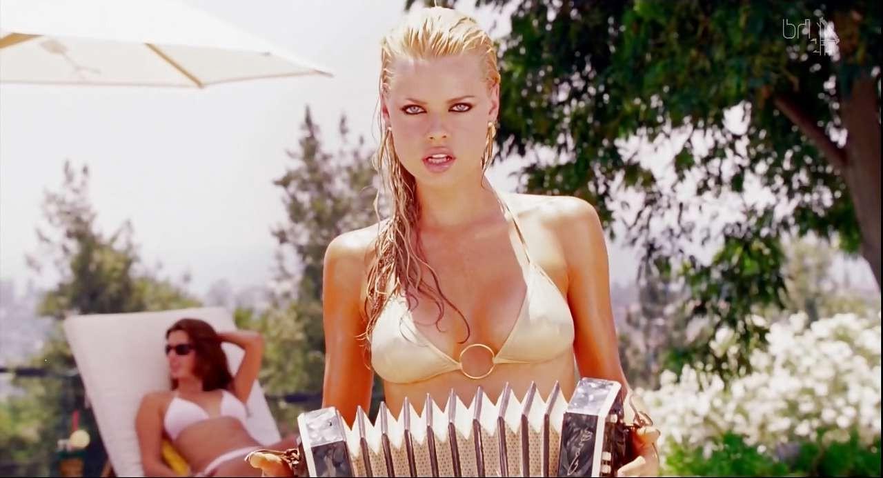 16P Sophie Monk exposing her nice big tits and looking sexy in bikini in movie