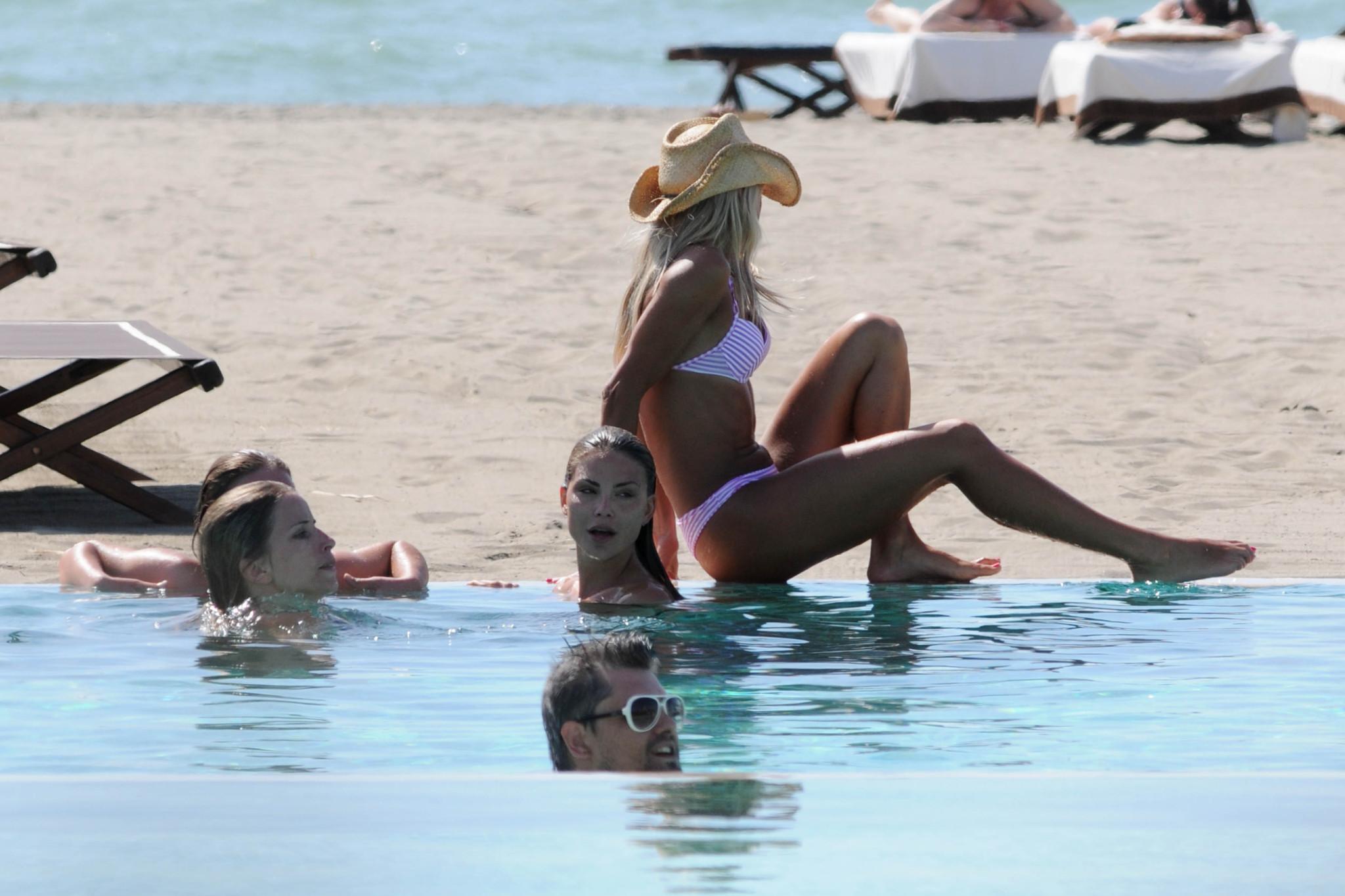 16P Nina Senicar shows off her ass wearing thong bikini on the Italian beach