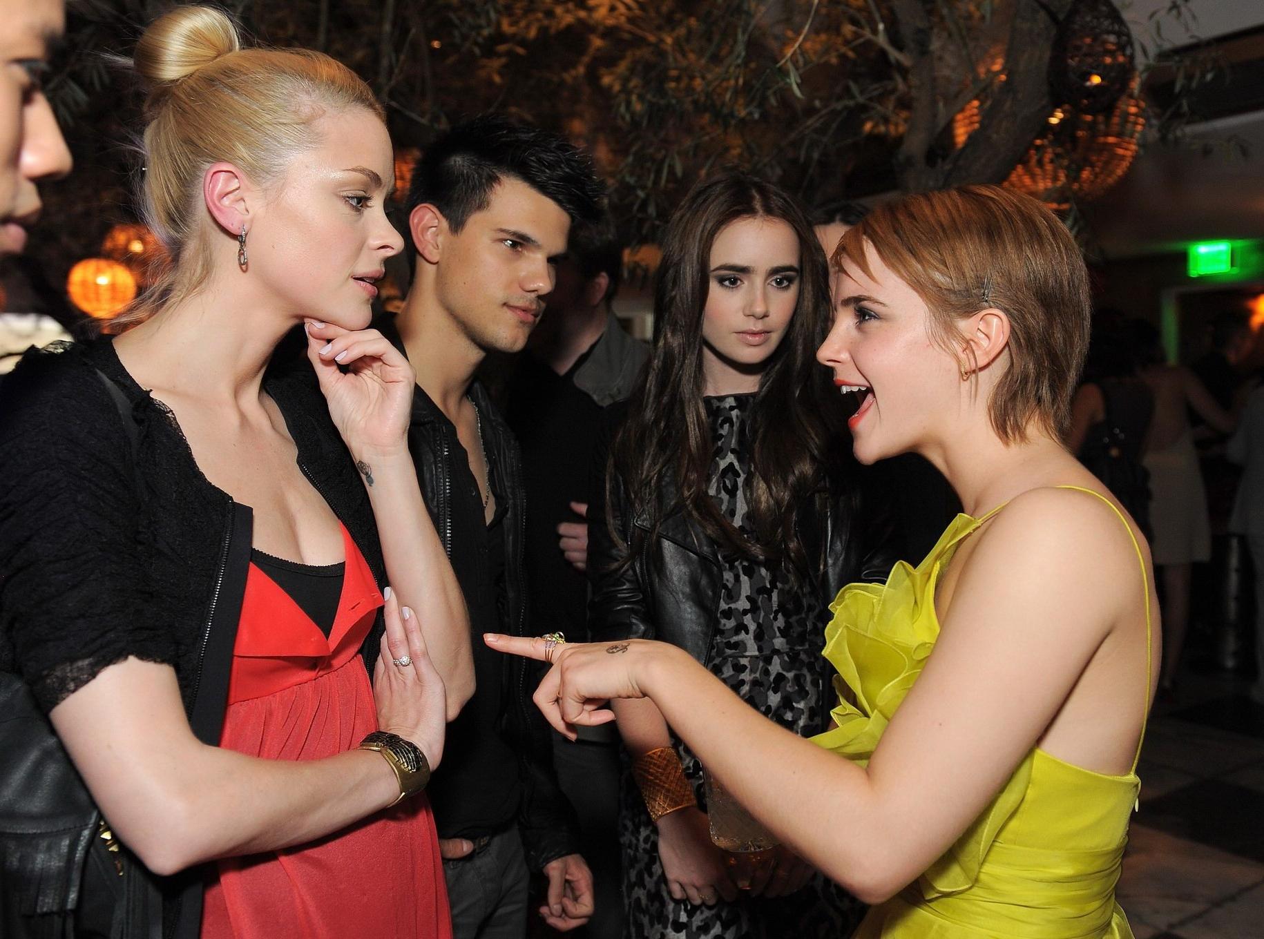 16P Emma Watson showing side-boob at MTV Movie Awards afterparty in Hollywood