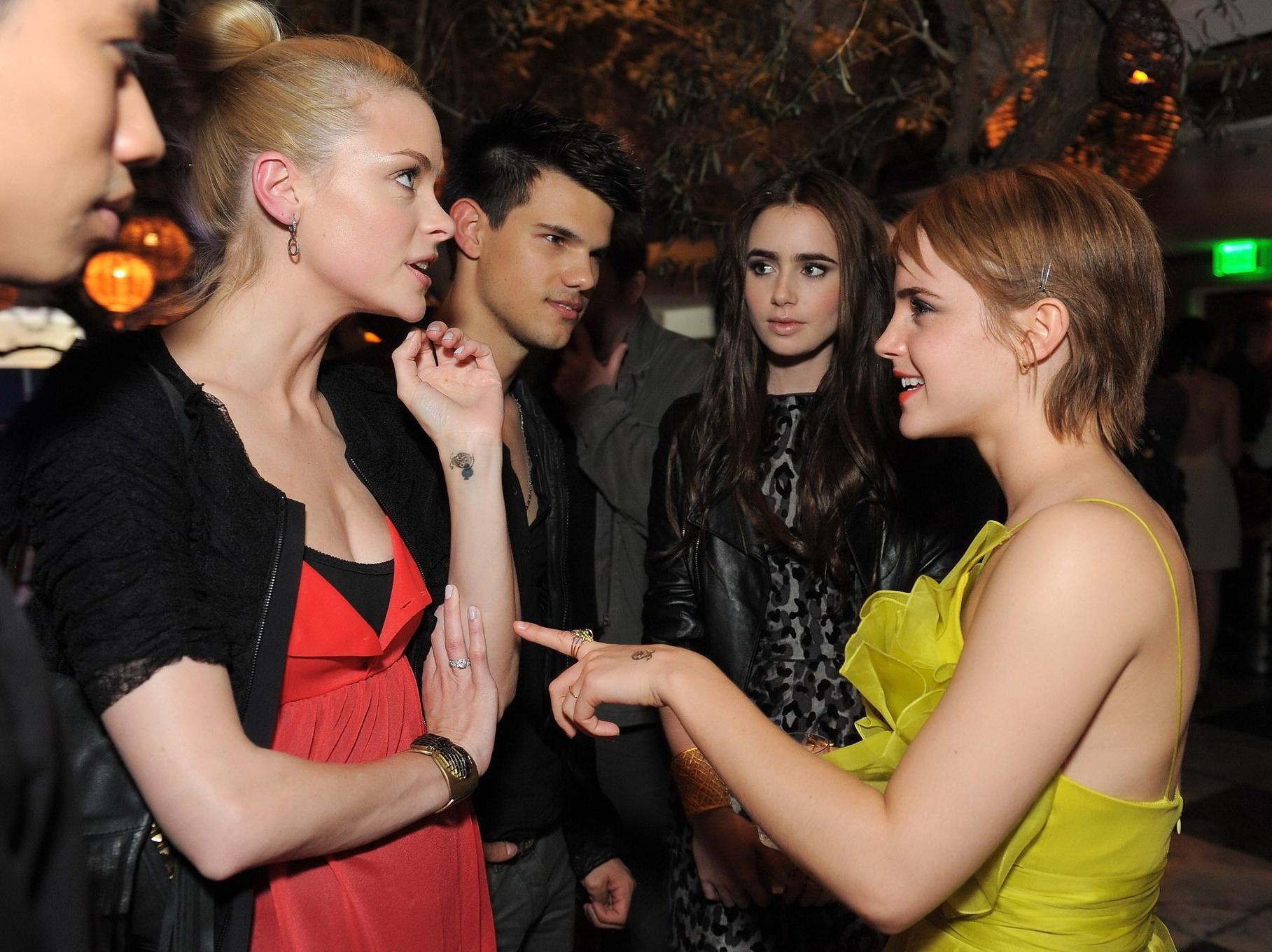 16P Emma Watson showing side-boob at MTV Movie Awards afterparty in Hollywood
