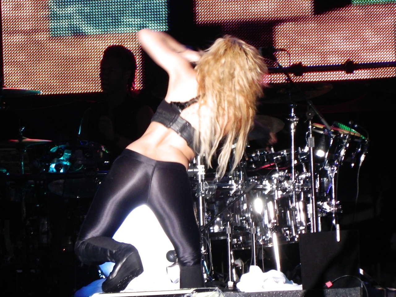 16P Shakira showing her great ass in latex pants and upskirt paparazzi pictures