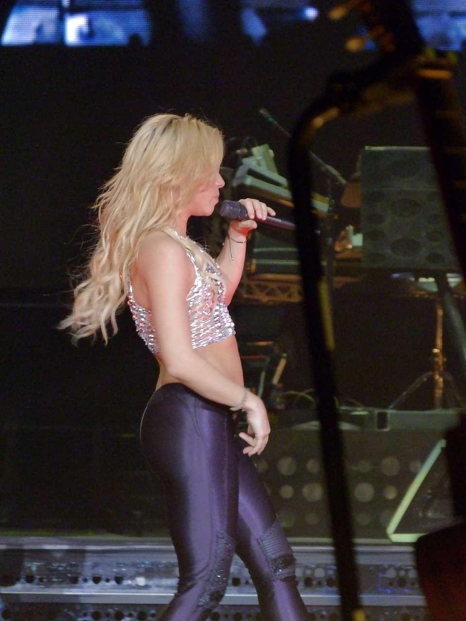 16P Shakira showing her great ass in latex pants and upskirt paparazzi pictures