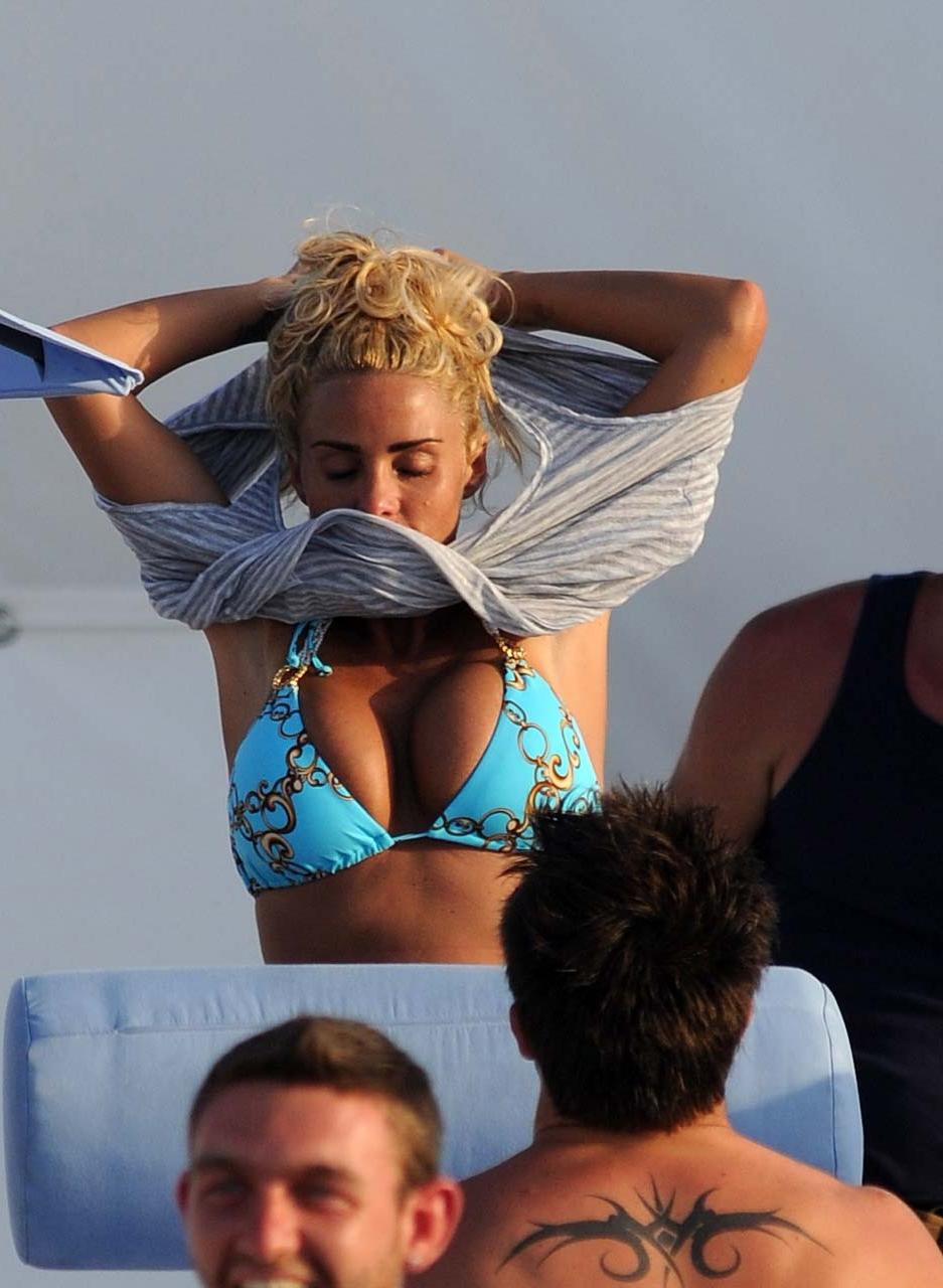 16P Katie Price Jordan looking sexy in bikini with boyfriend in pool paparazzi pictu